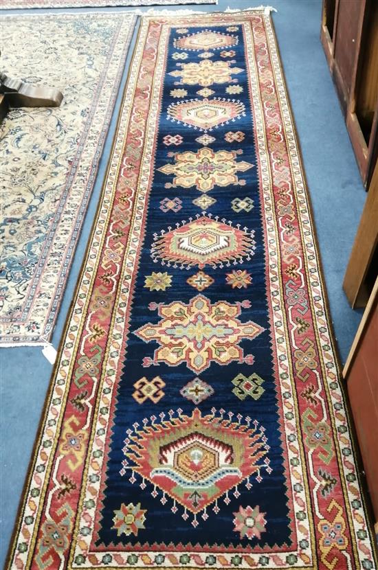 A Caucasian design blue ground runner 350 x 90cm